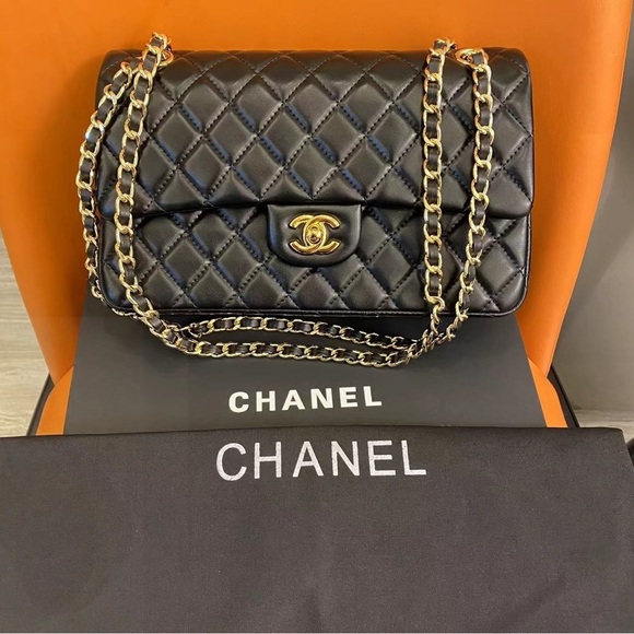 CHANEL Handbags - CHANEL Black Quilted Leather Shoulder Bag with Gold Chain